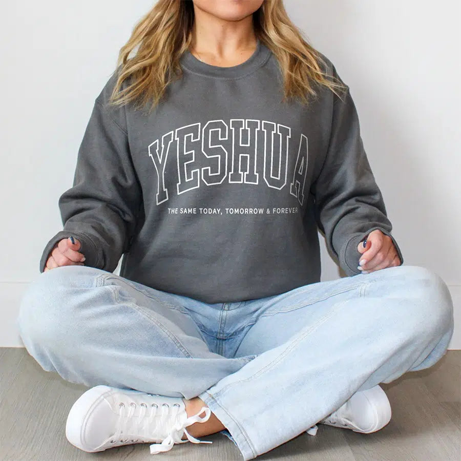 Women's Model Wearing Charcoal Yeshua The Same Today, Tomorrow & Forever Unisex Sweatshirt