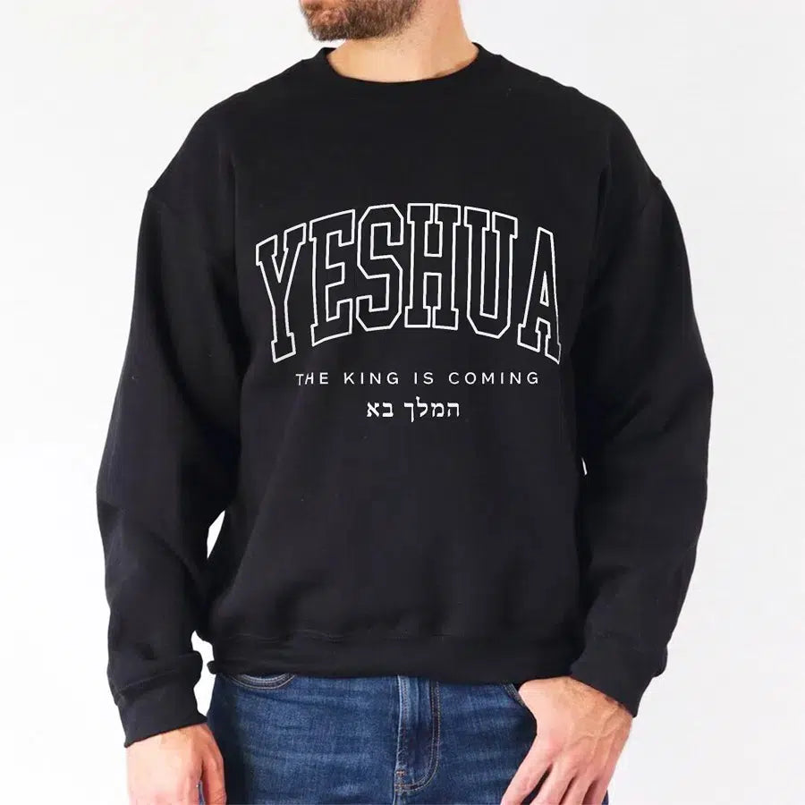 Mens Model Wearing Black Yeshua The King is Coming Unisex Christian Sweatshirt