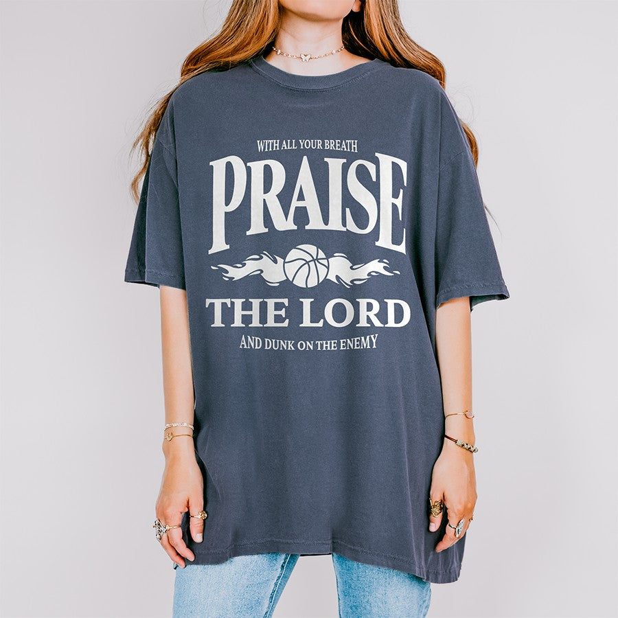 Womens Model Wearing Denim Praise The Lord and Dunk on the Enemy Unisex Tee