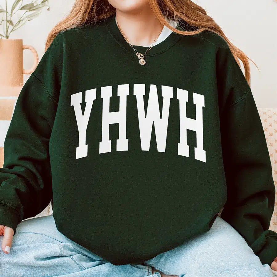 Womens Model Wearing Forest YHWH Unisex Christian sweatshirt
