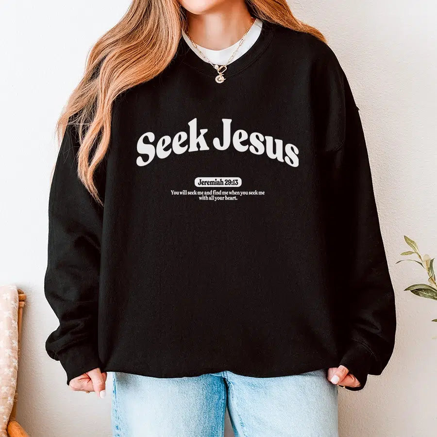 Womens Model Wearing Black Seek Jesus Unisex Sweatshirt
