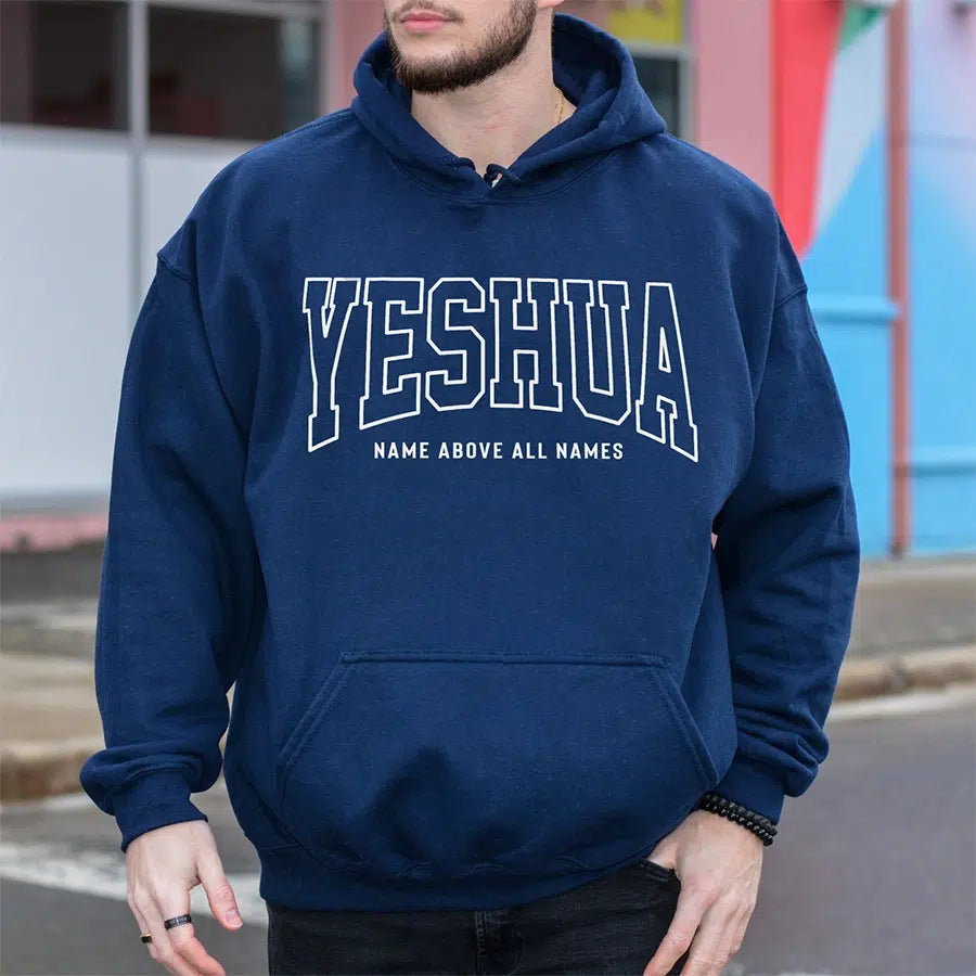 Mens Model Wearing Navy Yeshua Name Above All Names Unisex Hoodie
