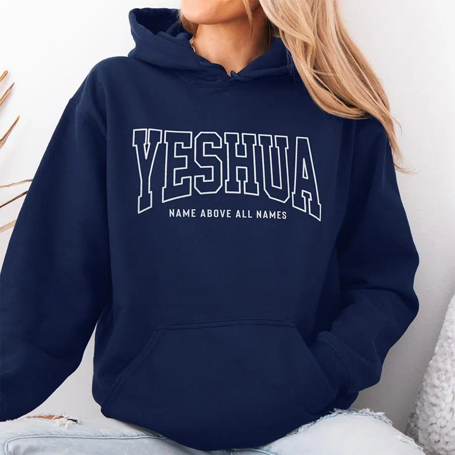 Womens Model Wearing Navy Yeshua Name Above All Names Unisex Hoodie