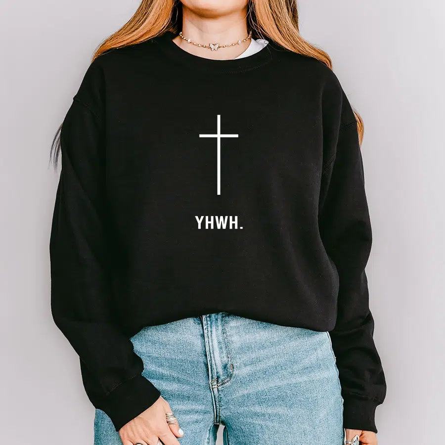 Womens Model Wearing Black YHWH Cross Unisex Sweatshirt