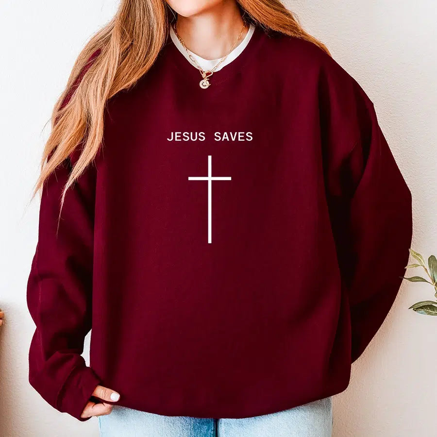 Womens Model Wearing Maroon Jesus Saves Cross Unisex Sweatshirt