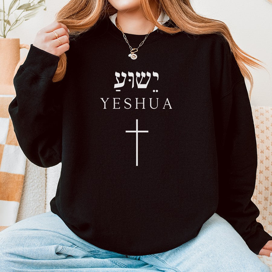 Womens Model Wearing Black Yeshua in Hebrew Cross Unisex Sweatshirt