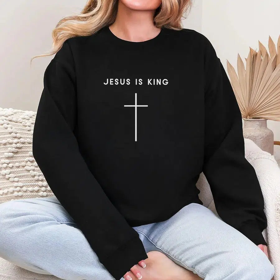 Jesus is King Cross Unisex Sweatshirt in black color