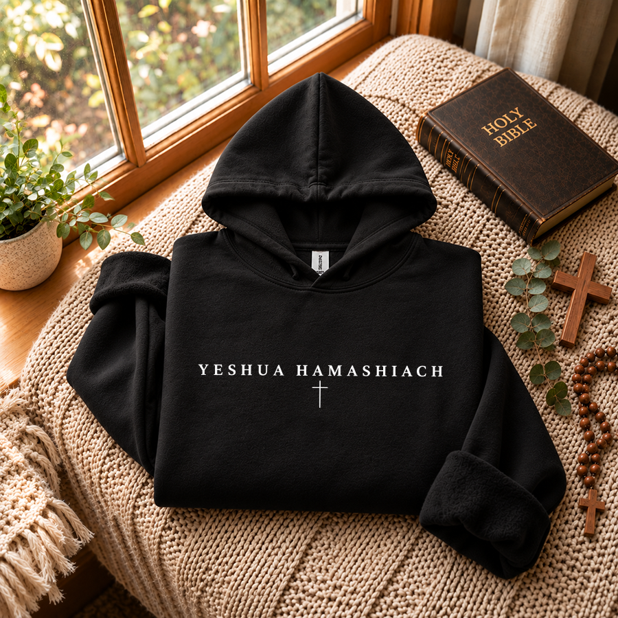 Yeshua Hamashiach Christian Hoodie in black - flat lay