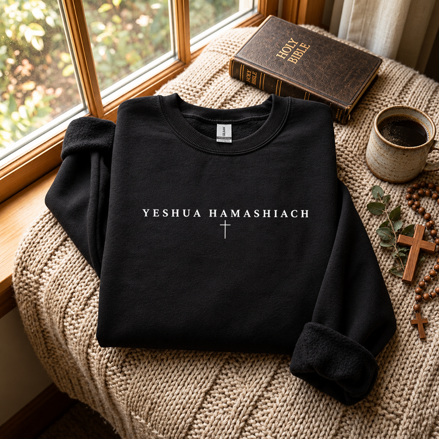 Yeshua Hamashiach Christian Sweatshirt in black - flat lay